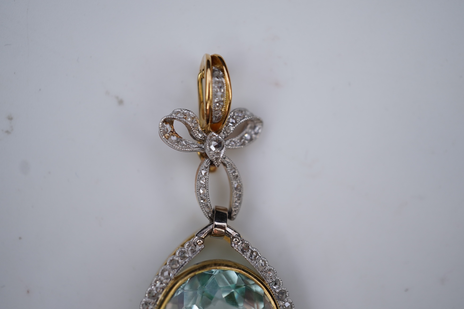 An aquamarine and diamond pendant